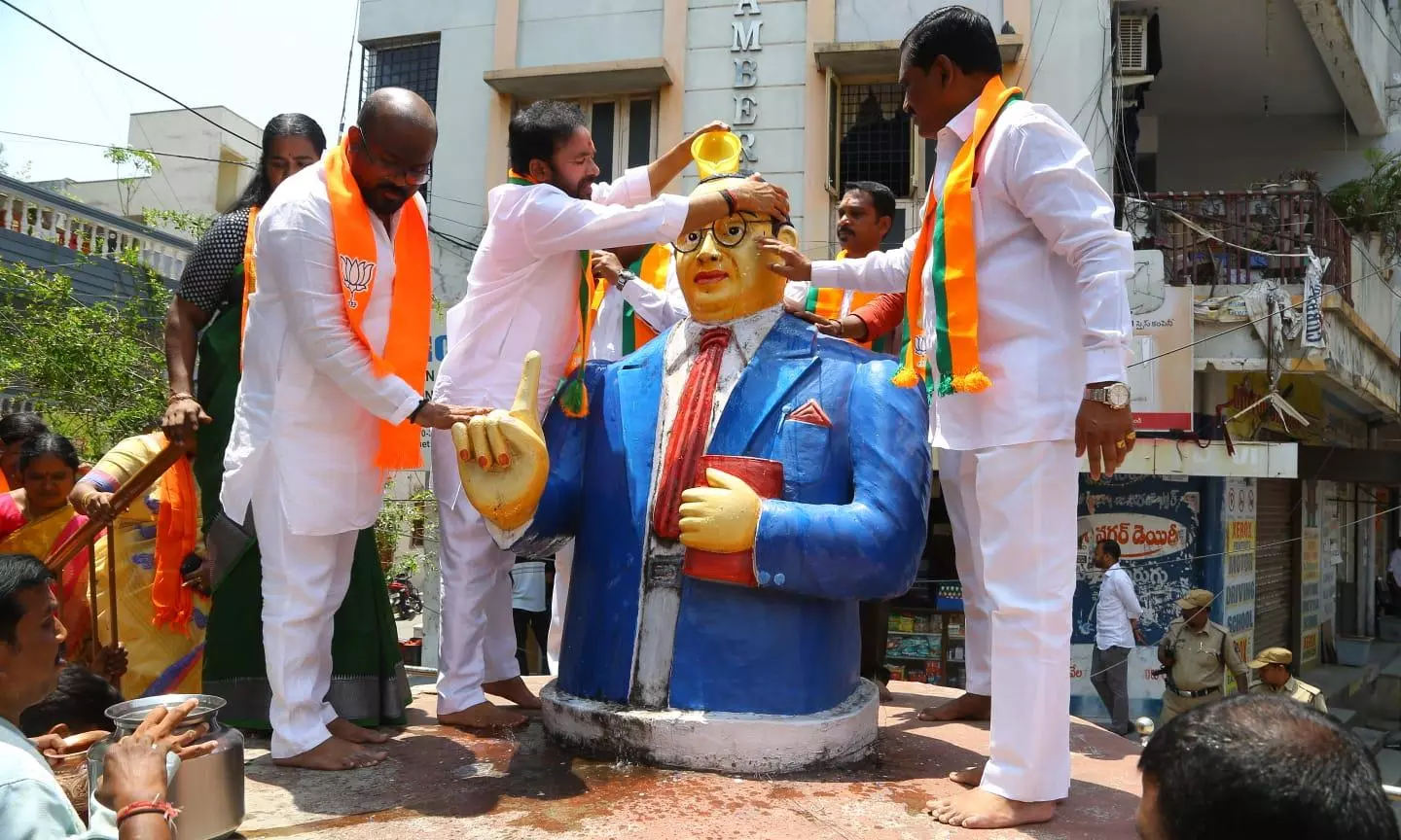 Kishan cleans Ambedkar statues in Hyderabad