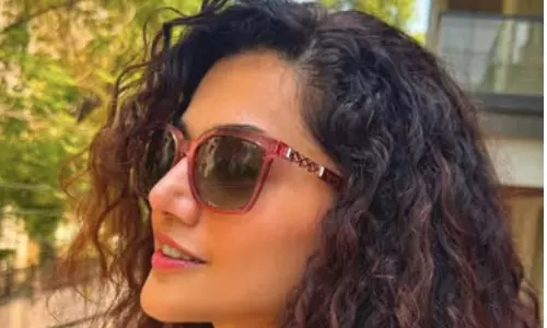 Taapsee Pannu Shines in Summer Style with Voluminous Curls and Chic Sunglasses! Taapsee Pannu Shines in Summer Style with Voluminous Curls and Chic Sunglasses!