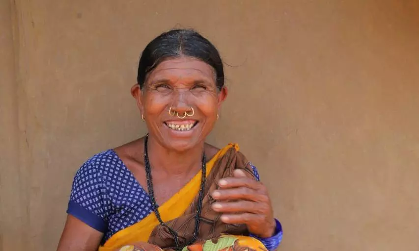 Pawan Distributes Footwear to Adivasis of ASR District