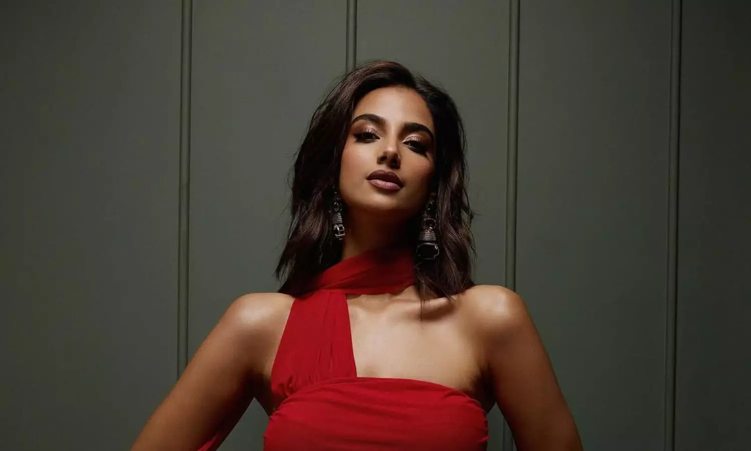 Meenakshi Chaudhary Sizzles In Red Bodycon Attire