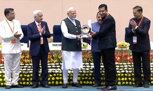 PM Fetes Adilabad Collector Rajarshi Shah