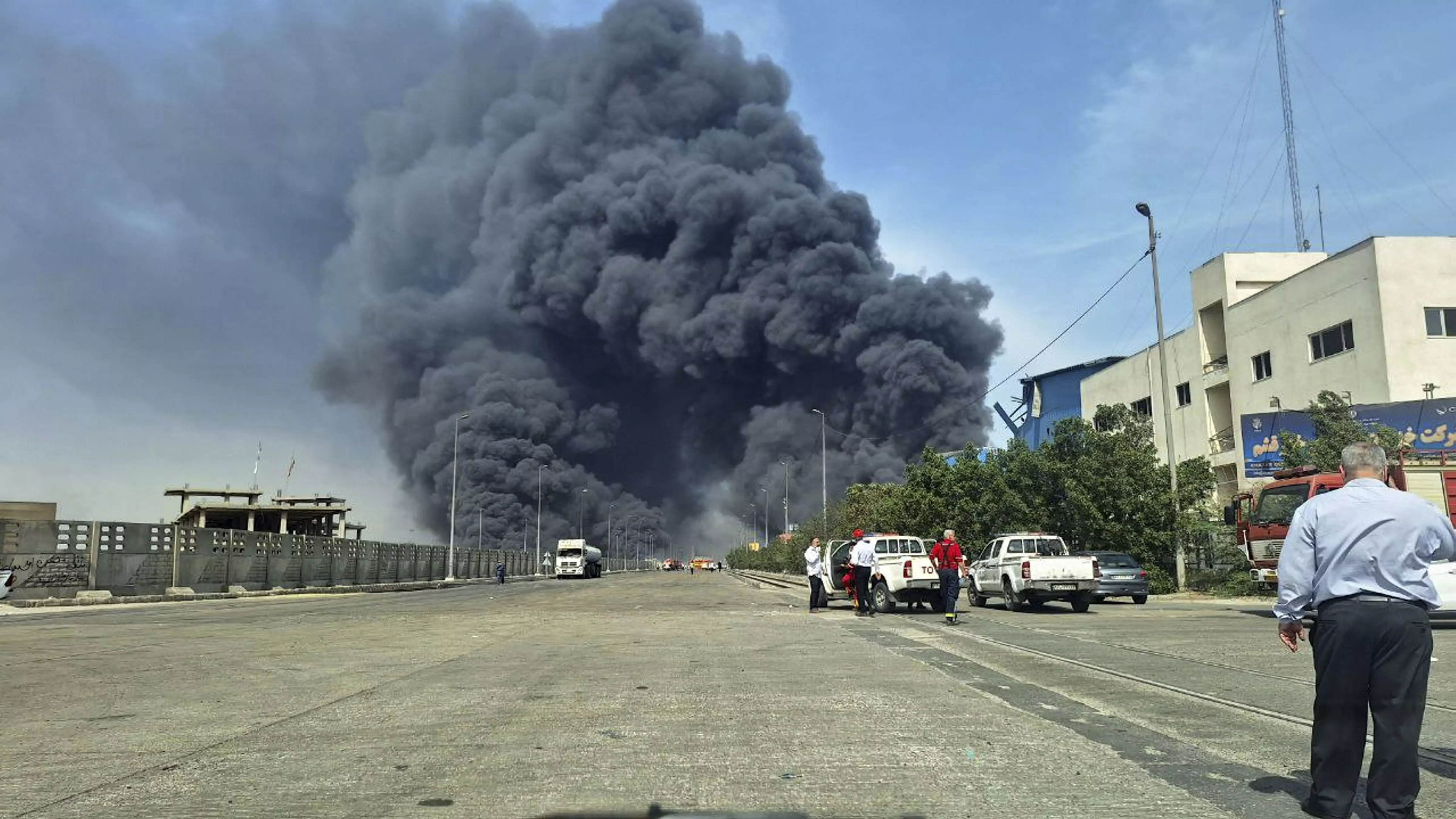 Fire Rages After Major Blast At Iran Port Kills 14, Injures 750