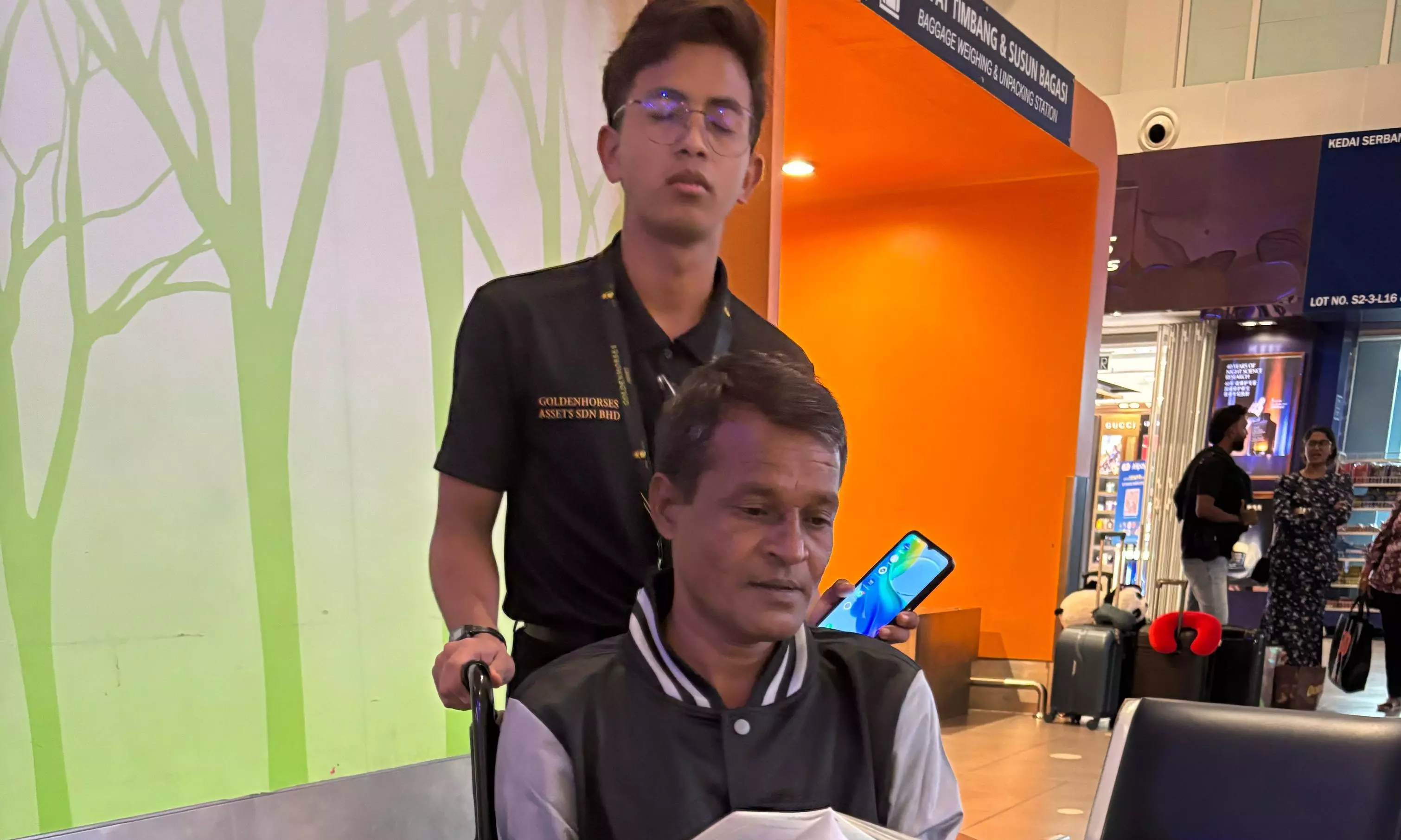 Injured Migrant Worker Returns Home From Malaysia In Ambulance