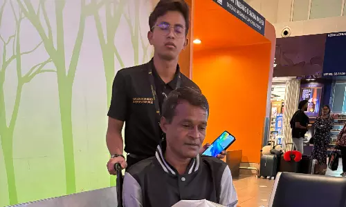 Injured Migrant Worker Returns Home From Malaysia In Ambulance