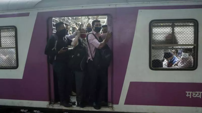Delayed Mumbai Local: Women Risk Lives Hanging from Overcrowded Train