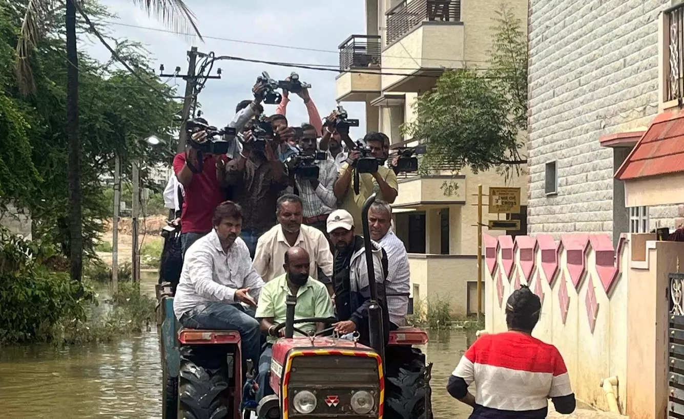 BBMP Chief Commissioner Inspects Flooded Sai Layout On a Tractor