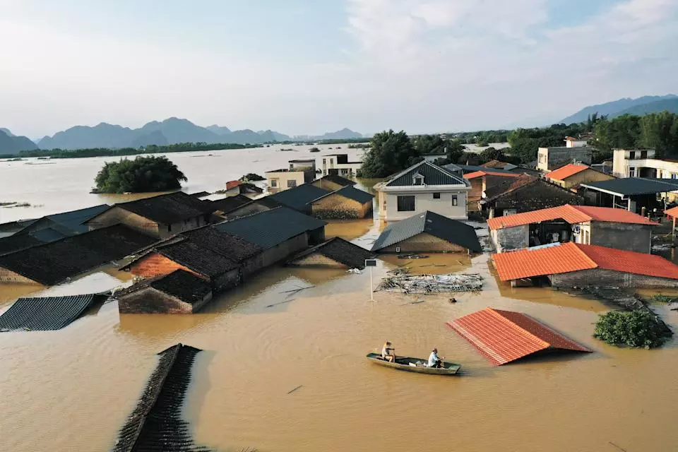 Flooding Destroys Dozens of Homes and Roads in China