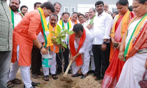 BJP Celebrates Modis 11-Year Rule in Nizamabad