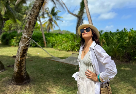 Actress Ritu Varma in a Serene Tropical Setting