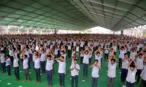 25K Tribal Students Set World Record in Vizag With 108 Surya Namaskar