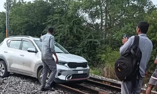 Woman Drives Car on Railway Tracks in Chevella, Held