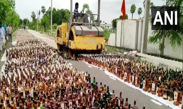 Illicit Liquor Worth Rs 21.50 Lakh Destroyed Using Road Roller