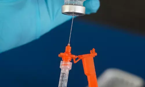 FDA Vaccine Chief Limits COVID Shot Use, Overruling Staff