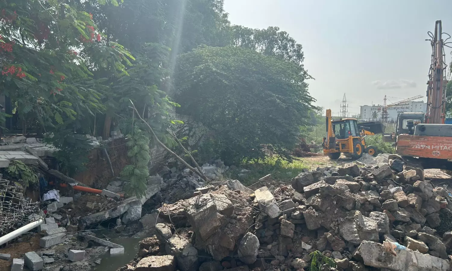 HYDRAA Demolishes Illegal Constructions on Nala in Habibnagar