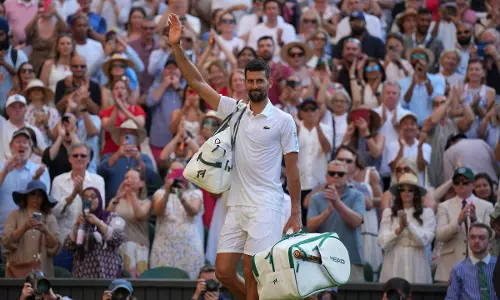 Djokovic Vows to Return to Wimbledon
