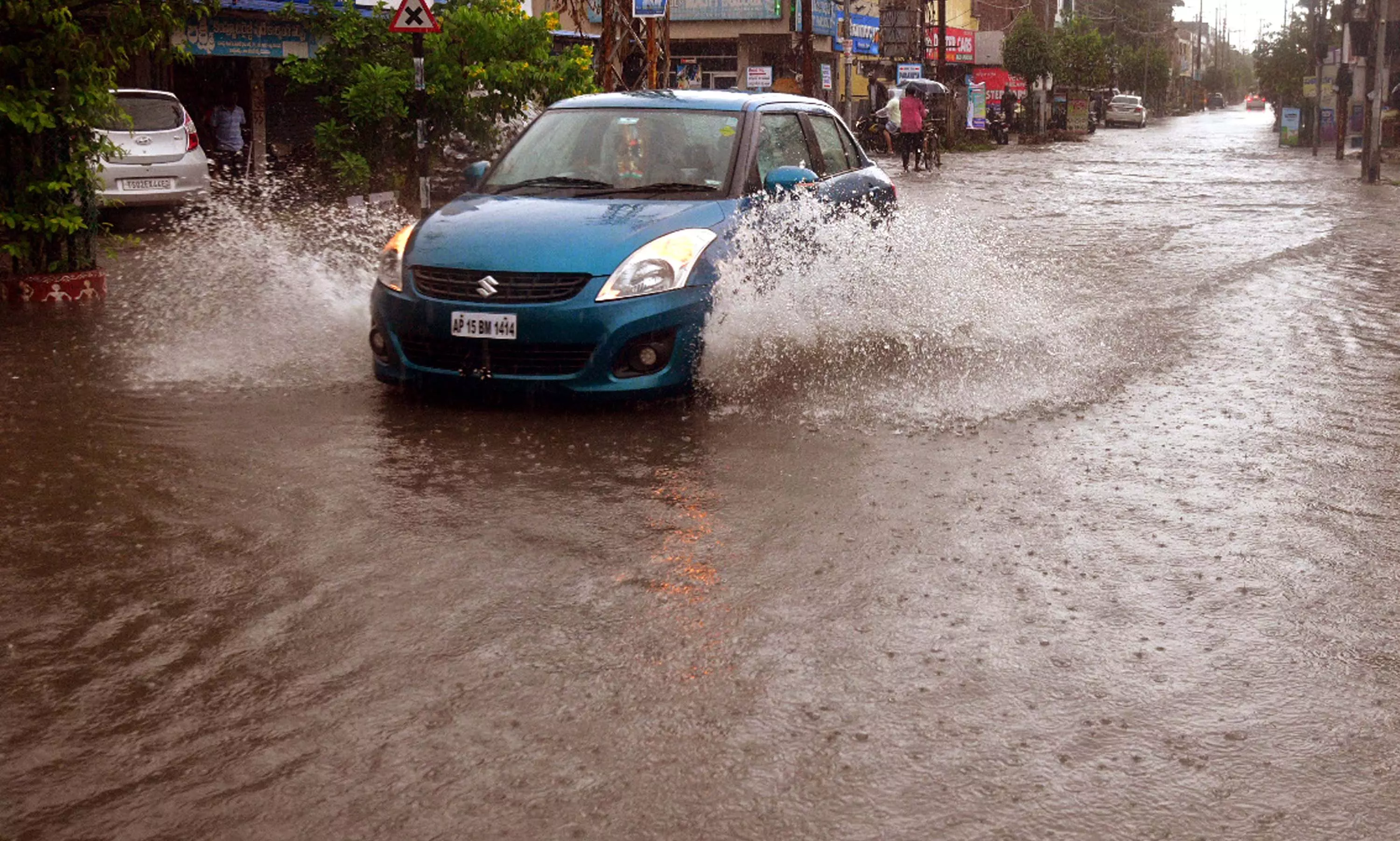 Heavy Rains Cut Off 13 Villages In Adilabad, Tractor Trapped In Mancherial