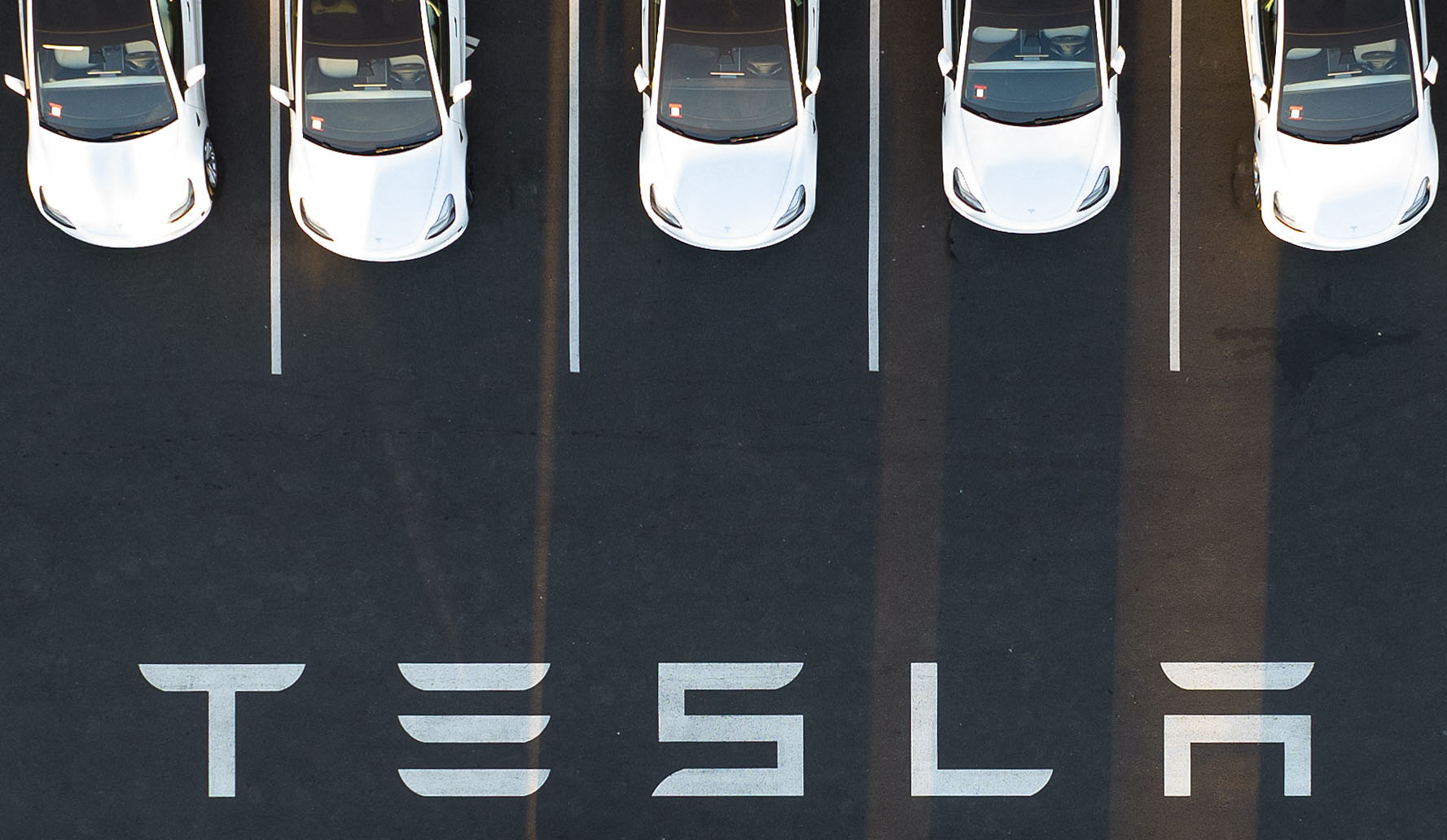 Tesla's Profits Dip Amid Market Challenges and Shifting Focus
