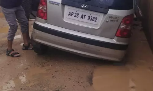 Rains Cripple Hyderabad Roads