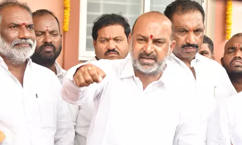 Bandi Challenges KTR to BRS Merger Debate
