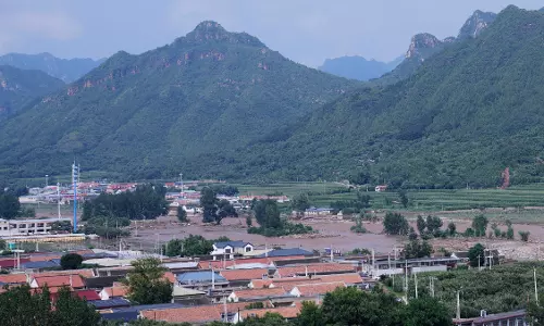 Heavy Rains and Flooding Kill At Least 34 People in Beijing
