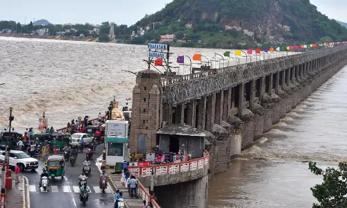 Floodwater Inflows Stable in Krishna, Godavari Rivers, 2nd Level Warning at Prakasam Barrage Floodwater Inflows Stable in Krishna, Godavari Rivers, 2nd Level Warning at Prakasam Barrage