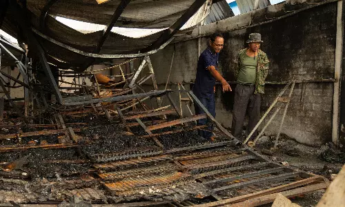 With Ceasefire in Place, Cambodians Come Back to Scenes of Destruction Along Thai Border