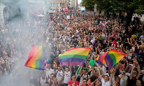 Read How an LGBTQ+ Cafes Neon Sign Became Beacon for Hate in Berlin