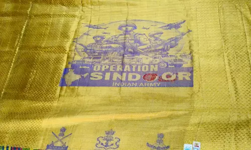 Sircilla Weaver Crafts Golden Shawl for PM Modi