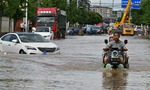 Beijing Evacuates More Than 80,000 Over Heavy Rains