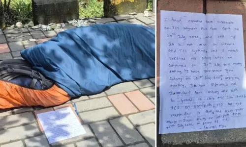 TCS Employee Sleeps Outside Pune Office Over Unpaid Salary TCS Employee Sleeps Outside Pune Office Over Unpaid Salary