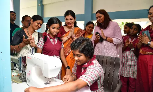 Collector Distributes Sewing Machines, Urges Life Skills