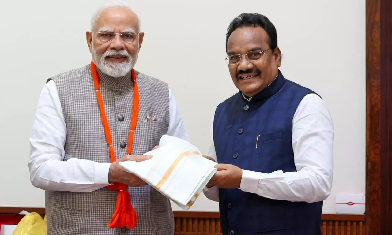 Adilabad MP Presents Handwoven Dhoti, Rumal to PM