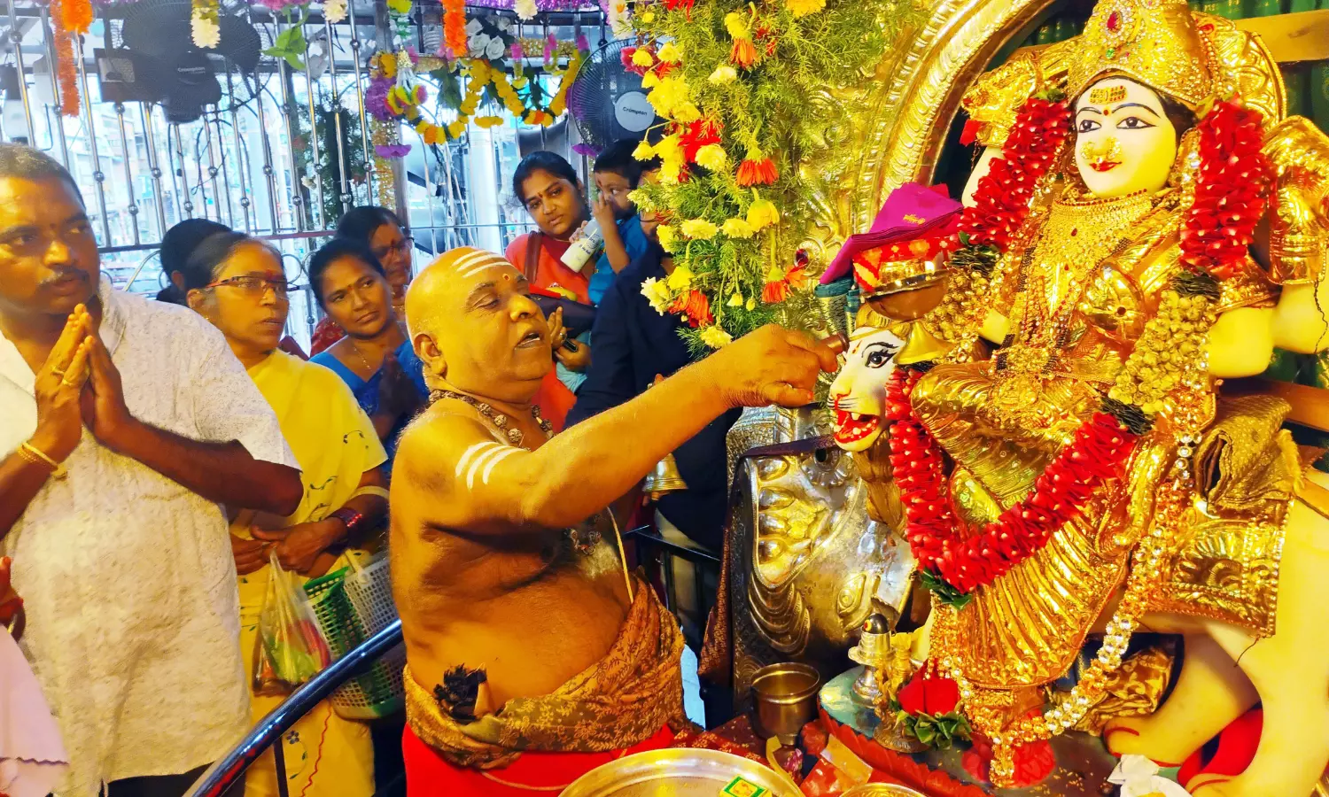Devotees Throng Goddess Temples For Varalakshmi Vratam In East Godavari