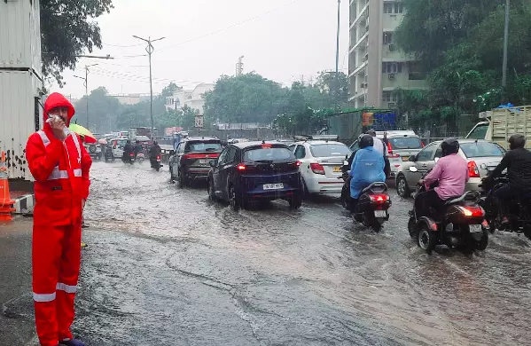 Cops Brave Floods To Aid Hyderabad City