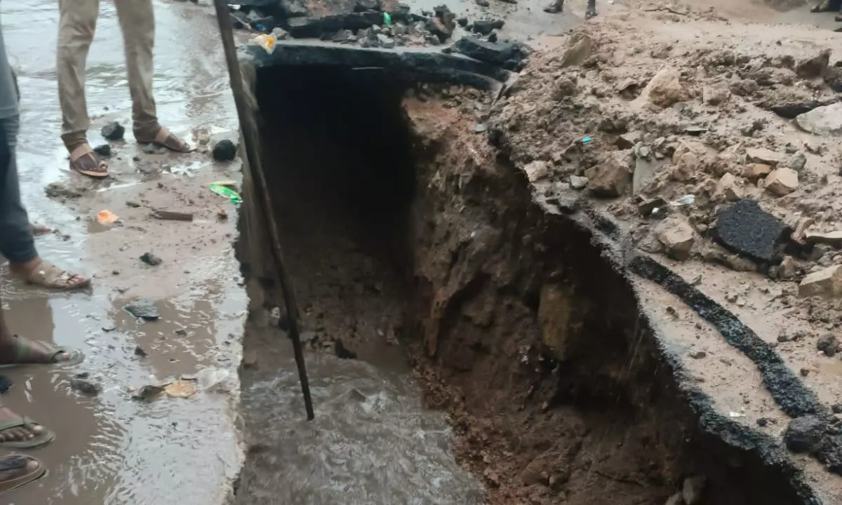 Pit Collapses Due to Rain, Sewage Flow