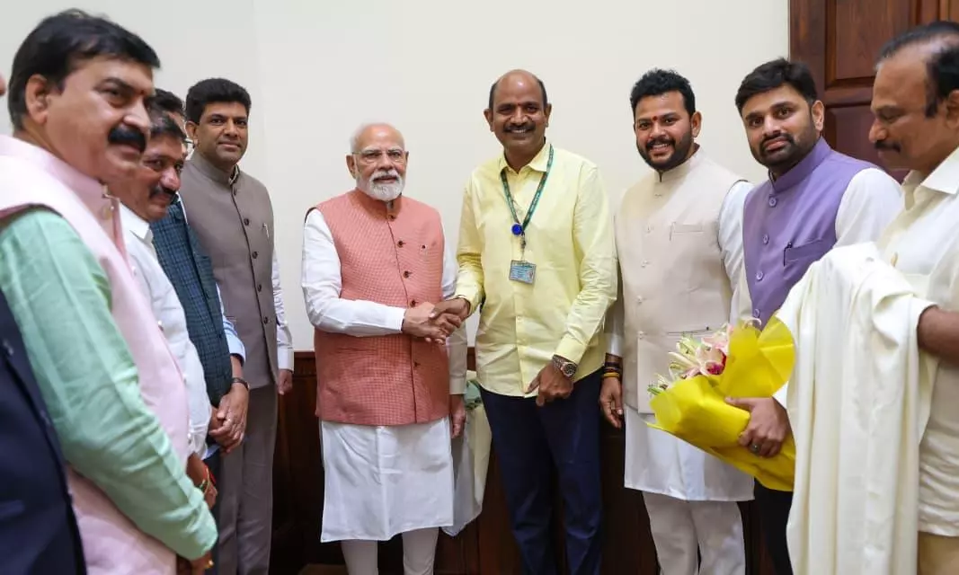 TDP MP  Appalanaidu Kalisettis Third Child Incentive Wins PM Modi’s Praise