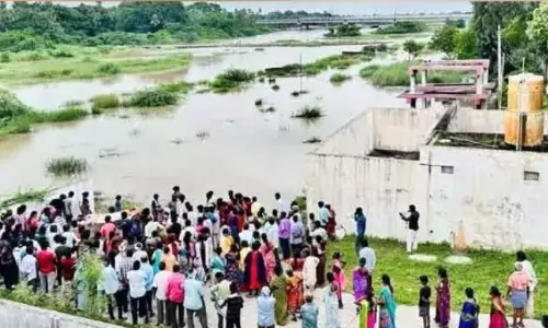 Flooded Burial Site Forces People to Bury Body on Roadside in Karimnagar