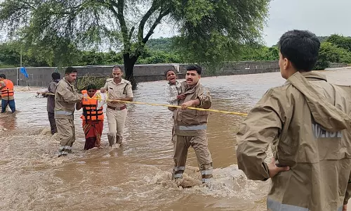 6 Family Members Stuck in Flood Water Rescued In Adilabad