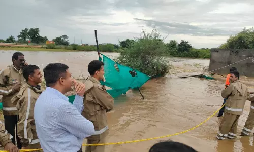 6 Family Members Rescued from Floods in Adilabad 6 Family Members Rescued from Floods in Adilabad