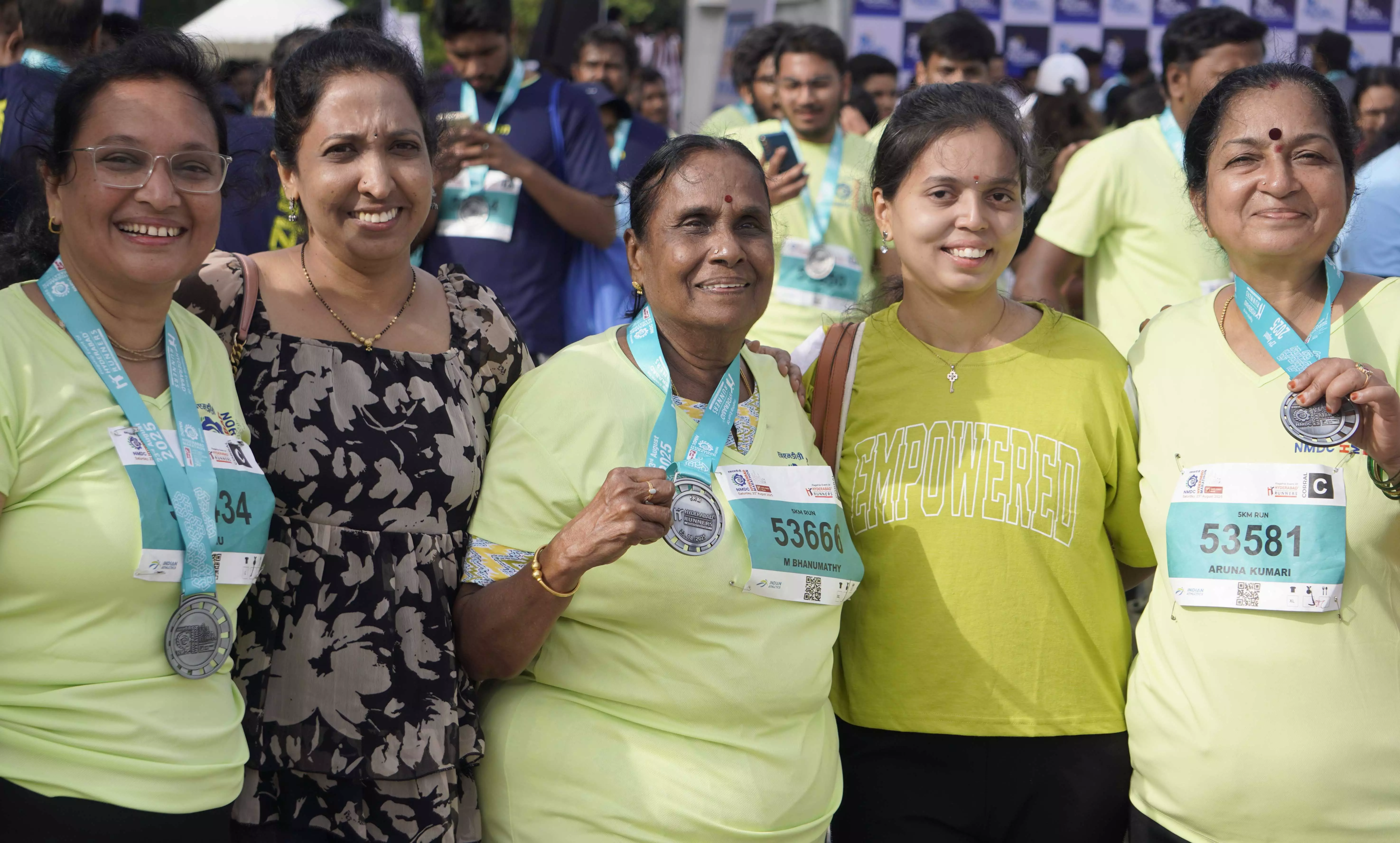 Every Finish Line, A New Beginning 8K Runners Light Up NMDC Marathon
