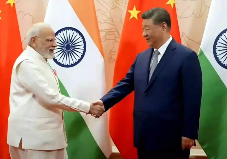 Modi, Xi Vow to Deepen Relations