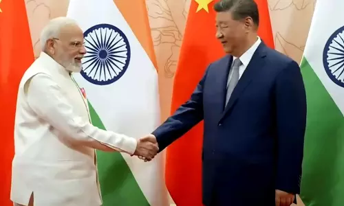 Modi, Xi Vow to Deepen Relations