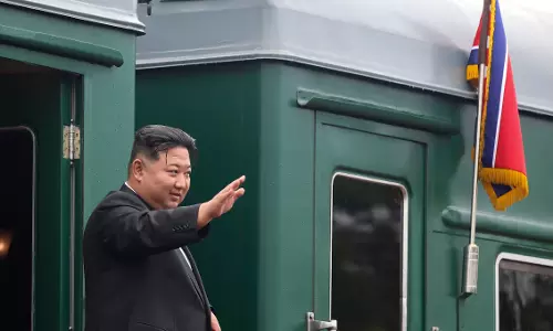 Kim Heads to Beijing to Watch Military Parade with Xi, Putin