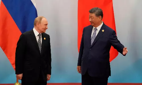 Xi, Putin Affirm Old Friend Ties Amid US Challenges