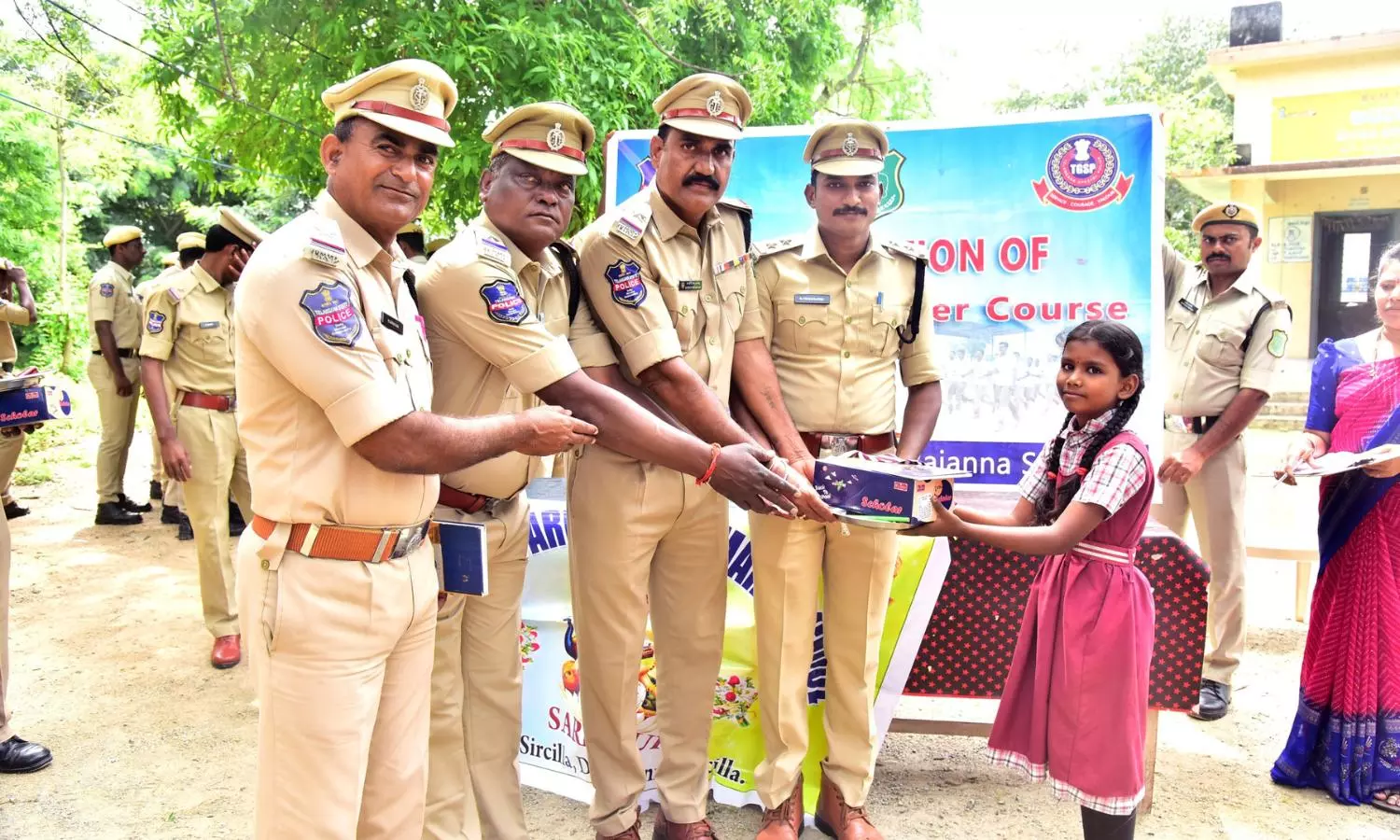Students Receive Educational Material From Police