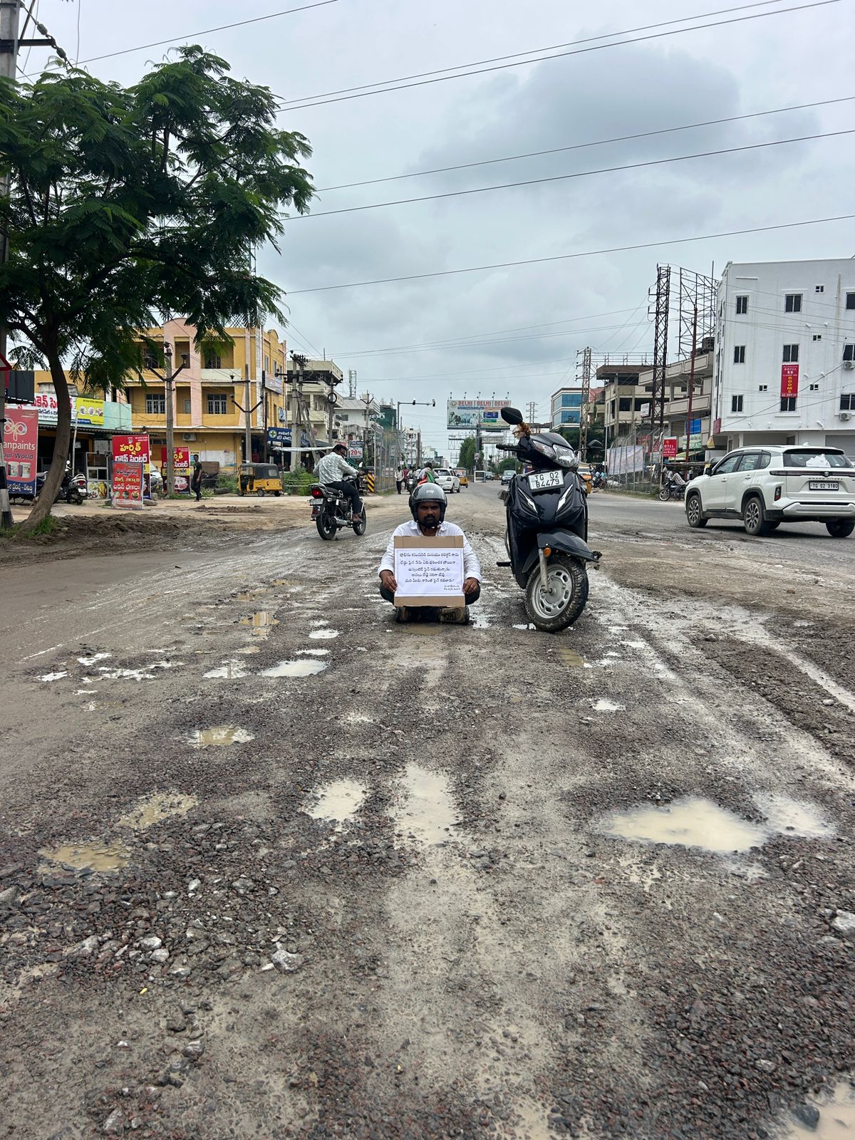 Activist Protests Poor Road Conditions in Karimnagar