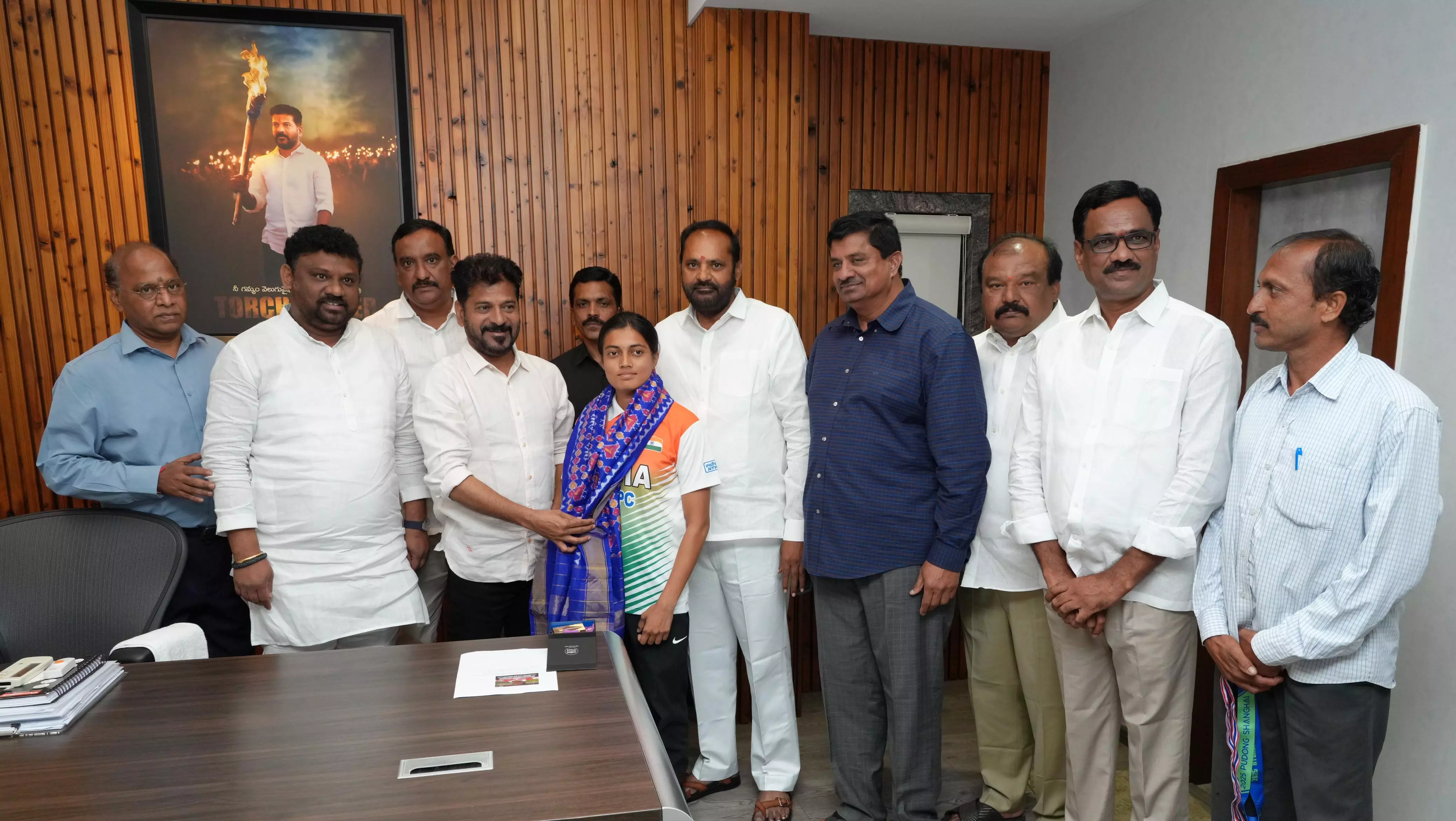 Revanth Reddy Felicitates Archery Champion Chikitha Taniparthi Revanth Reddy Felicitates Archery Champion Chikitha Taniparthi