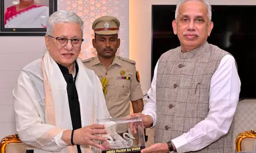 Telangana Governor Calls On AP Counterpart