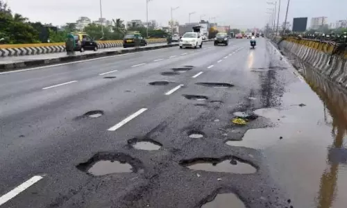 Rains Leave Hyderabad Roads in Ruins