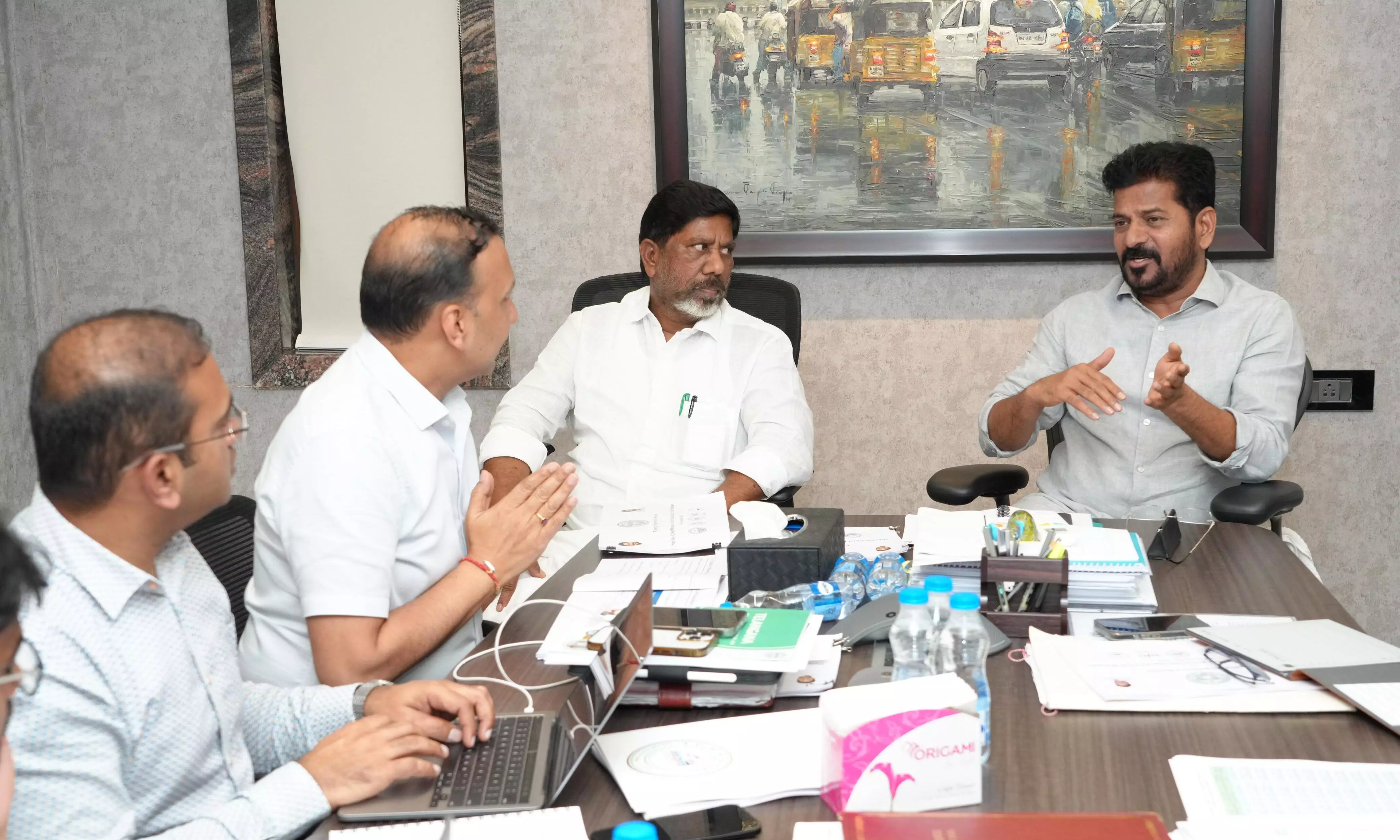 Remodel 2 Discoms into 3, Says Revanth